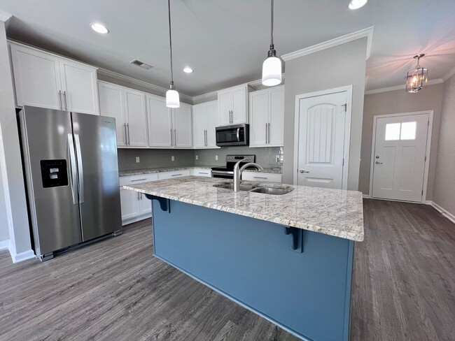 Photo - 3 bed/2.5 bath at end unit townhome in Berkeley Walk at Savannah Quarters with garage