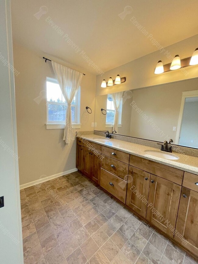 Photo - Modern home with fenced private yard in a great neighborhood!