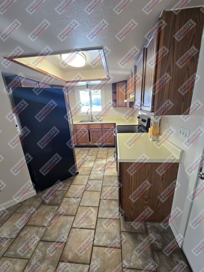 Photo - Single family home with a garage