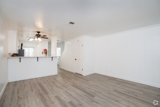 2BR, 1.5BA - 1000SF - Living Room - Leafy Grove