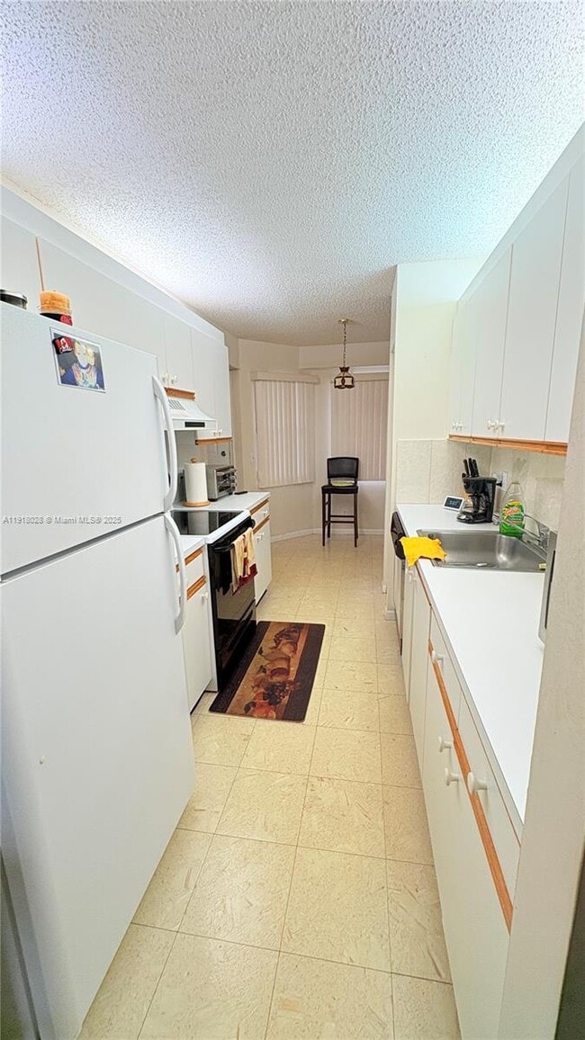 Photo - 12900 SW 13th St Unit 413E