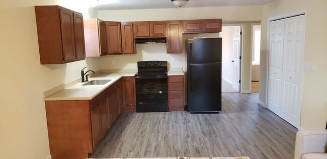 Photo - Settle in and cozy up in this comfortable lower-level two-bedroom apartment.