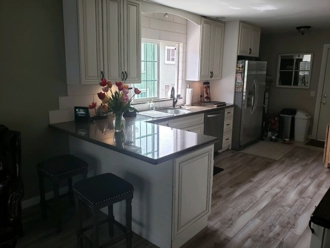Kitchen open to the living room - 2011 Rockefeller Ln