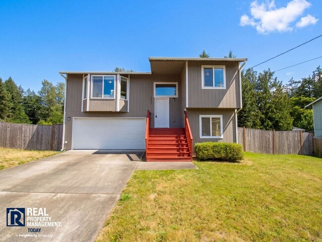 Building Photo - Spacious Graham Home with 2-Car Garage & Large Backyard