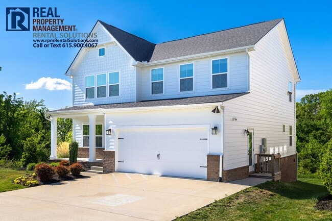 Photo - Great 4 bd 2.5 ba with attached garage and large deck!