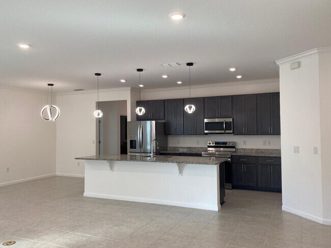 Photo - Like New 3 bedroom + den with French doors, screened in porch and Fenced yard and much more...