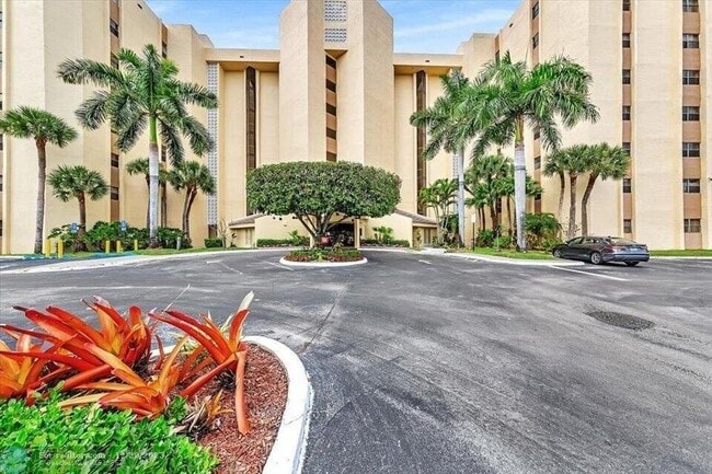 Building Photo - 7400 Radice Ct Unit 108