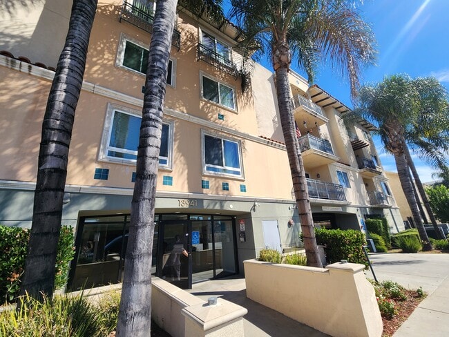 Building Photo - 13941 Sherman Way Unit 207