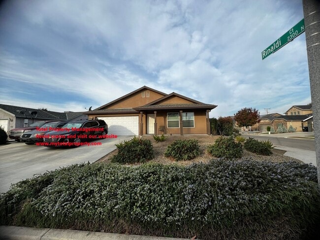 Building Photo - 2323 N RINADLI 3 BEDROOM 2 BATHROOM - SOLAR PANELS - VISALIA - Coming soon.