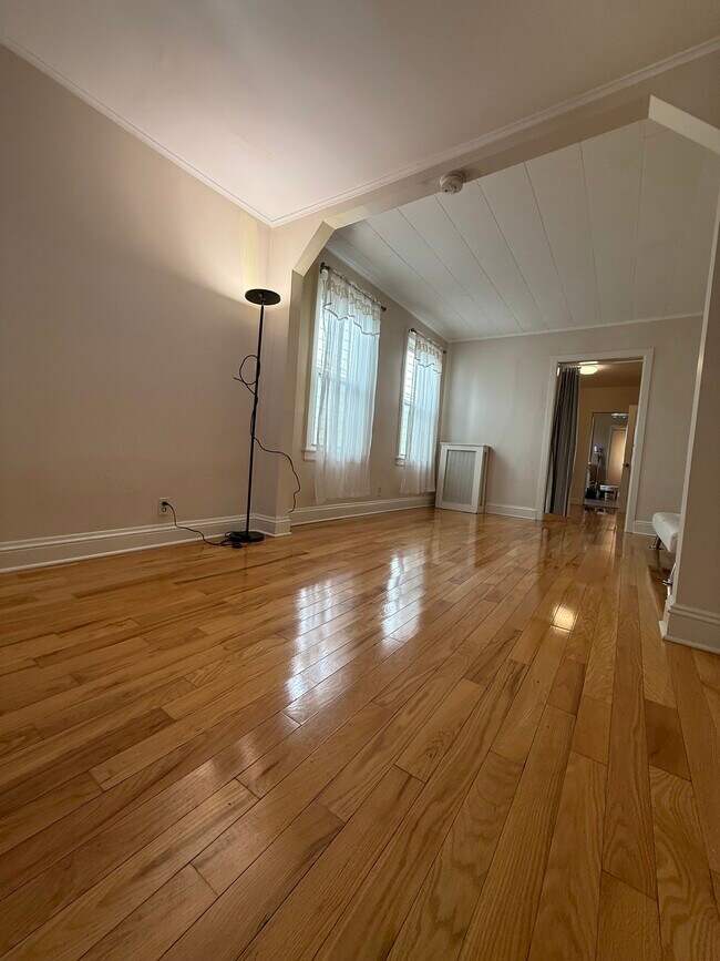 Living room and extra office space - 6284 Austin St Unit A