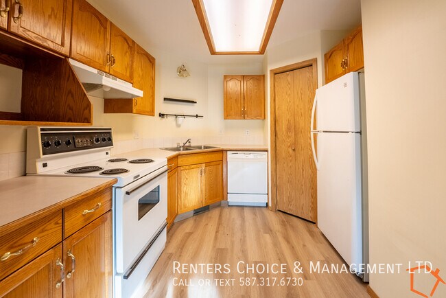 Photo - Easy Walk to Downtown Amenities, Assigned Parking, Spacious Townhouse