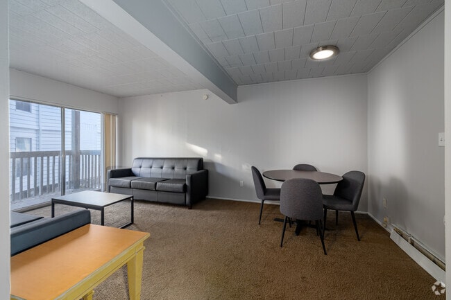 2BR, 1BA - 1,004SF - Living Room and Dining Room