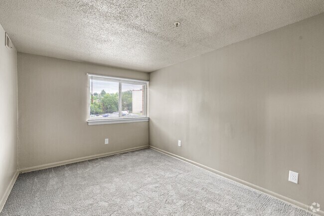 3BR, 1.5BA - 818SF - Bedroom 1 - The Village at Chesapeake