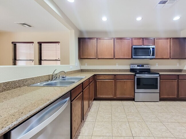 Photo - Large fully applianced kitchen!