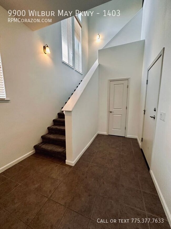 Photo - 9900 Wilbur May Pkwy