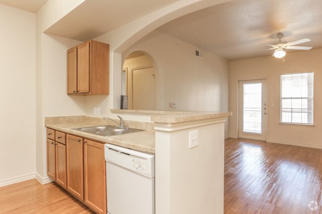 2BR, 2BA - 989SF Kitchen and Living Room - Woodlawn Ranch Apartments