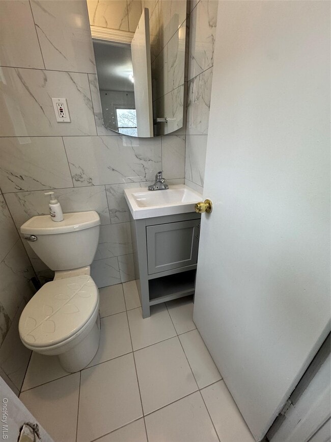 Photo - 144-05 21st Ave