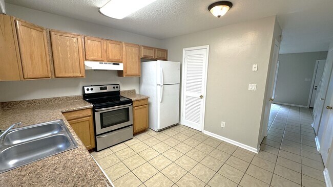 Photo - LOVELY 2/1.5 w/ Deck, & Privacy Fenced Yard! Available Now for $1250/month
