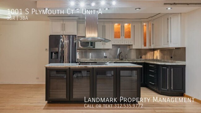 Photo - 1001 S Plymouth Ct Unit A Unidad A