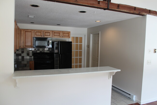 living room into kitchen - 180 Cherry Brook Rd Apartments Unit 180 2bedroom