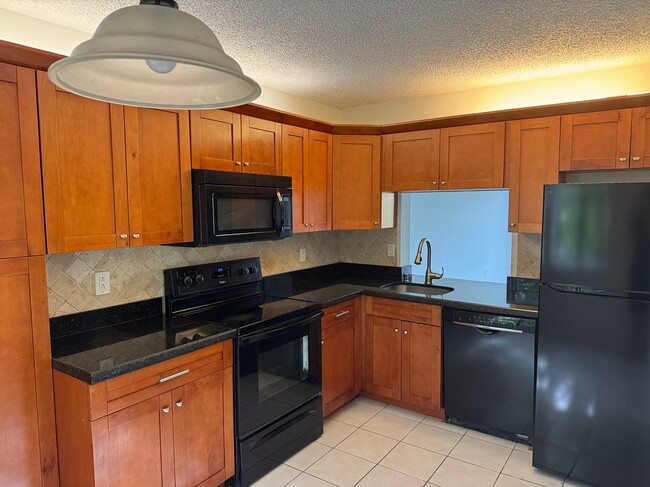 Building Photo - 3733 Carambola Cir N Rental
