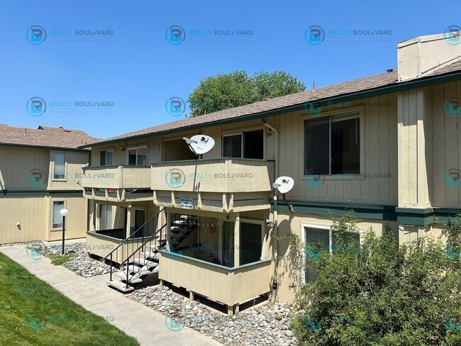 Building Photo - This delightful 2-bedroom, 1-bathroom condo perched upstairs offers an irresistible opportunity y...