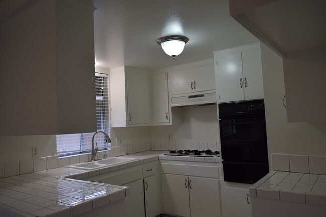 Kitchen: New Appliances Coming Soon! - 1945 Evergreen St Unit 1945