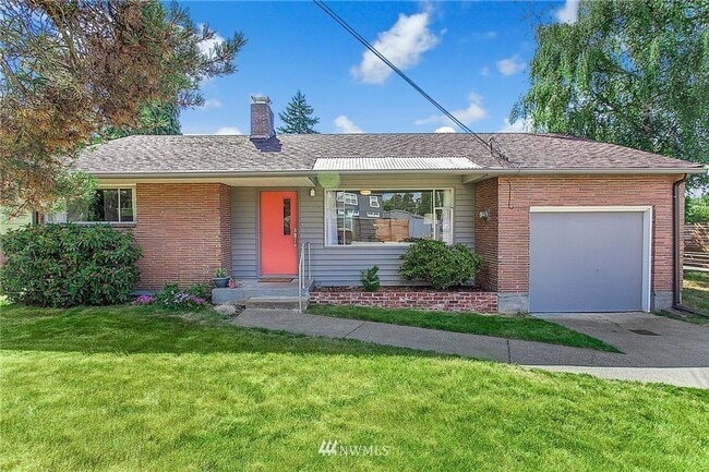 Building Photo - Midcentury Modern Rambler with Designer Kitchen & Spacious Fenced Yard