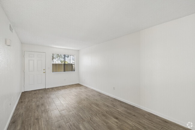 2BR, 1BA - 728SF - Living Room - Pine Ridge Apartments