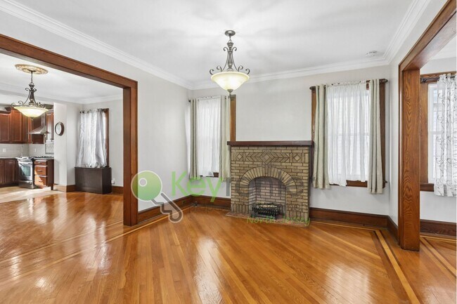 Photo - Spacious 4BR Single-Family Home with Garage, Driveway & Fenced Yard in Kearny