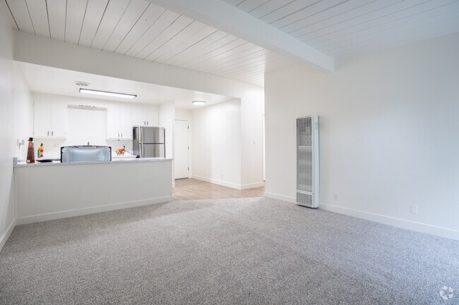 2BR, 1BA - 900SF - Living Room - Leafy Grove