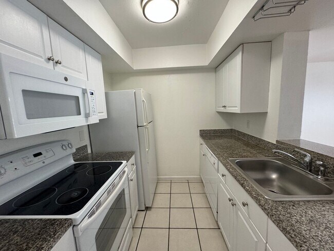 Photo - Lovely 2 Bedroom, 1.5 Bathroom Home in Orlando! Minutes from Top Attractions!! (Water Included!)
