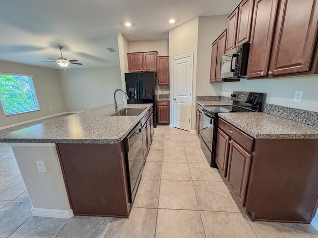 Photo - "Charming 3-Bedroom Home with Elegant Granite Touches in Wimauma!" Community pool! Fitness center...