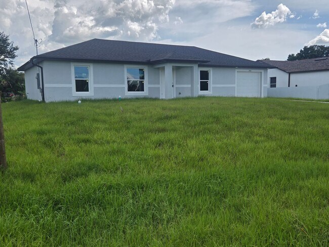 Building Photo - BRAND NEW 3/2/1 SW LEHIGH ACRES Rental