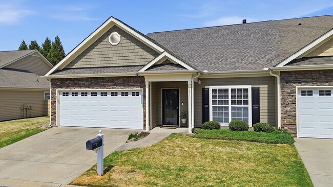 Photo - Experience refined, low-maintenance living in this beautifully appointed end-unit townhome
