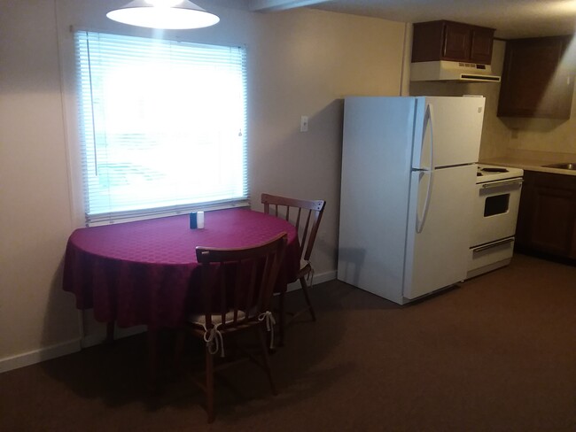 walk in to kitchen, large window to see parking lot and yard. Clean appliances - 333 Main St Apartments