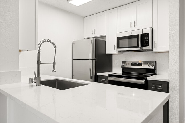 Cook, dine, and gather in a stylish kitchen space.