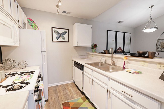 Spacious kitchen with modern appliances and ample counter space for cooking and entertaining.
