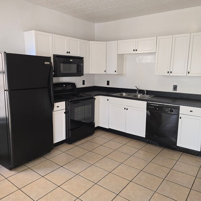 Photo - Large remodeled 4 bedroom with off street parking available**FREE MONTH OF RENT TO ANYONE WHO SIG... Unit 507- 509 Nott St - 1