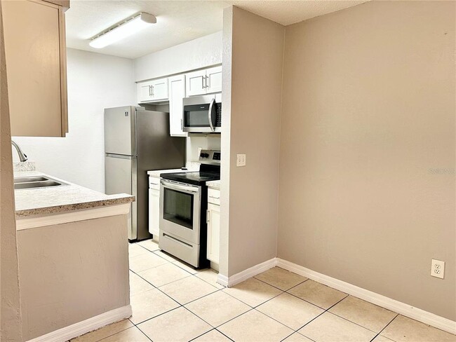 Photo - 5801 Windhover Dr Unit A01