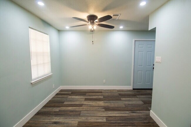 Photo - Updated West Pensacola 3BR Home with Luxury Plank Flooring, Modern Kitchen, 1-Car Garage & Large ...