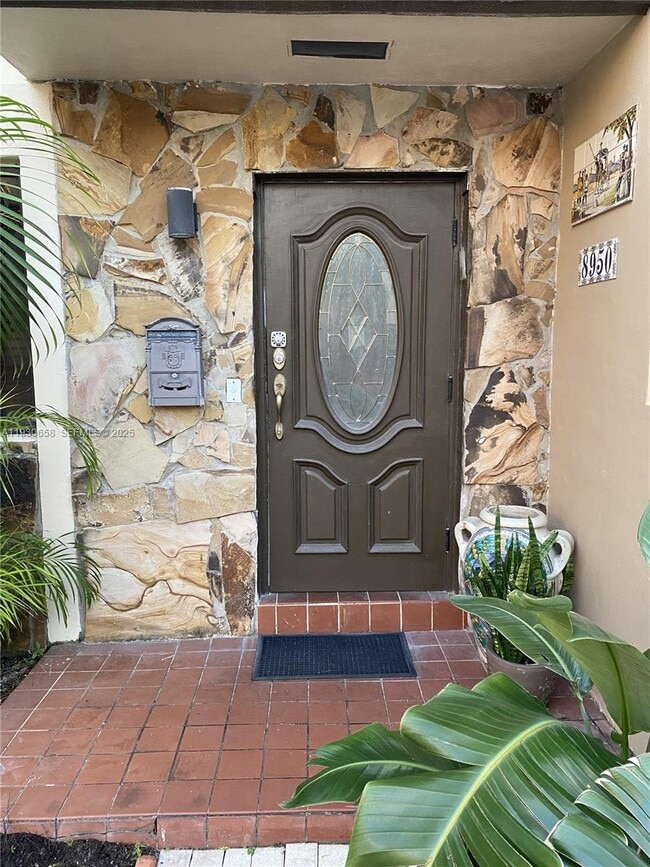 Building Photo - 8950 Collins Ave Unit 7