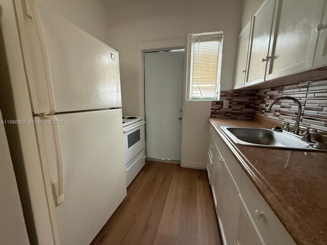 Photo - 6830 Harding Ave Unit 1