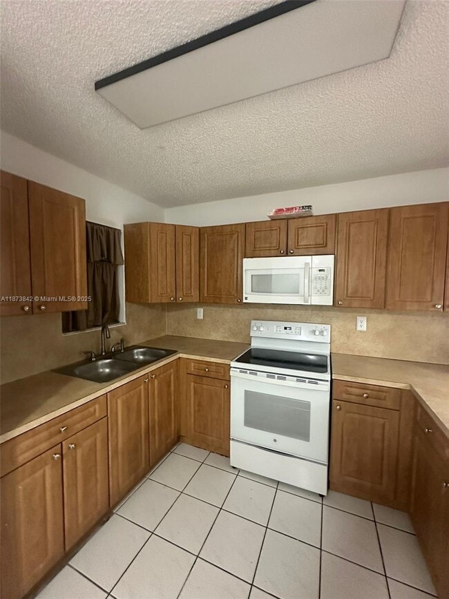 Photo - 2690 W 76th St Unit 102