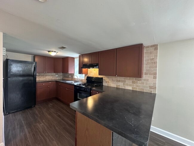 Photo - 3301 N Ozanam Ave Unit G