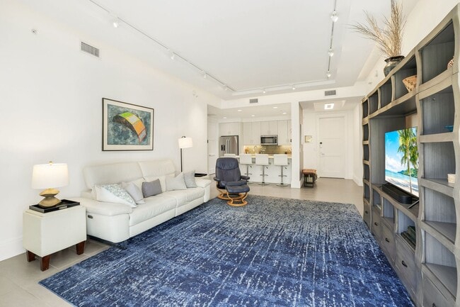 Photo - Luxury Living Meets Prime Location! Naples Square 2/2 Condo with Expansive Terrace