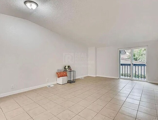 Photo - 7110 E 63rd Ave