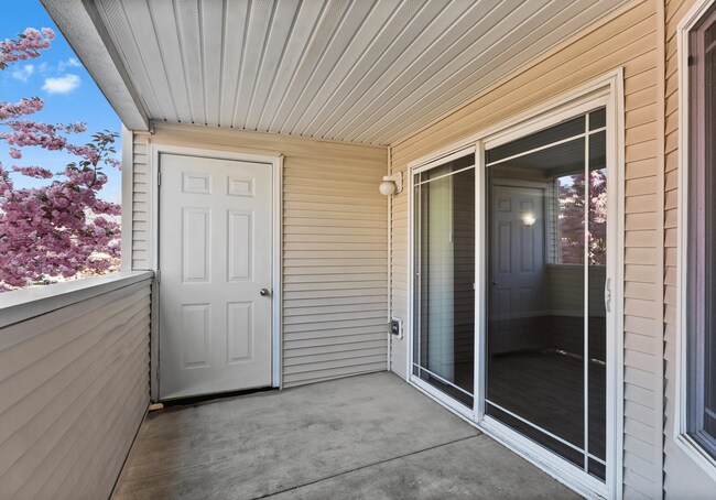 Private covered balcony with extra storage space.