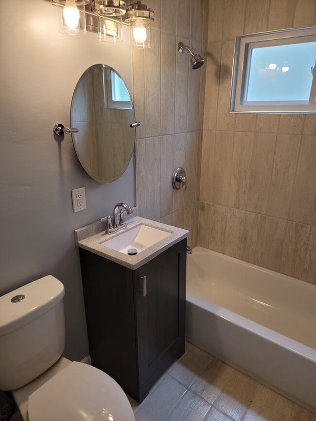 Photo - 5973-75 n 83rd st