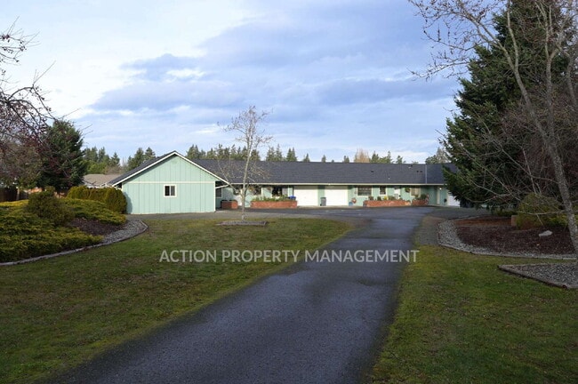 Photo - 2 bed, 2 bath, 1 car garage- water, sewer and yard care included! Unit A